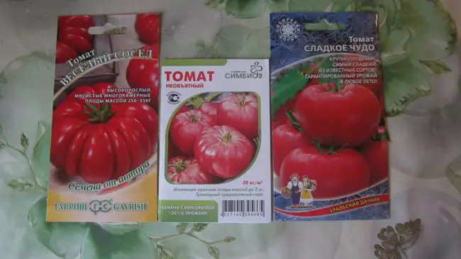 Томат Красавец мясистый: характеристика и описание сорта, урожайность с фото